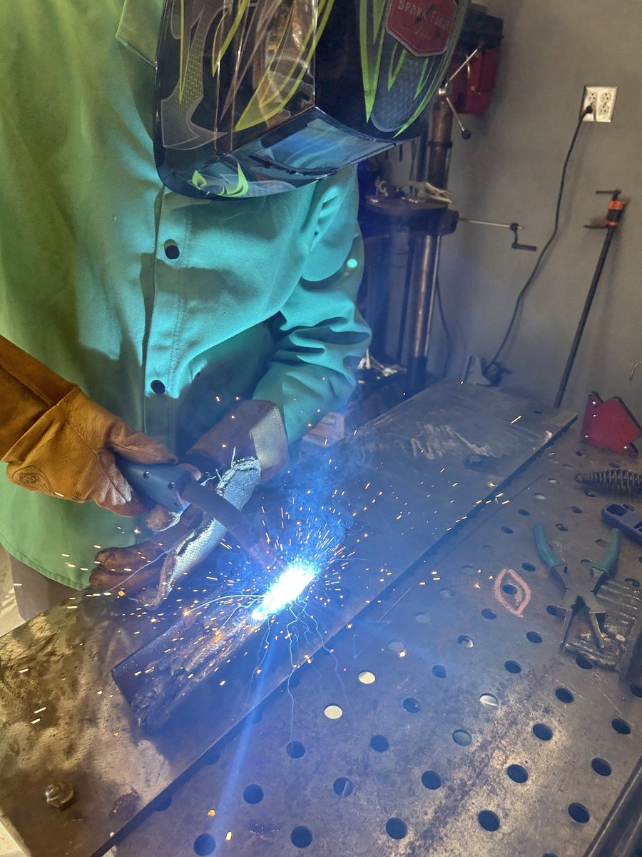 Welding sparks at Spark Forge Labs
